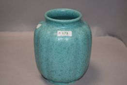 An Arts and Crafts era Pilkingtons Royal Lancastrian studio pottery vase in a green mottle glaze no.