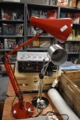 A vintage red Anglepoise lamp and a similar brushed steel example.