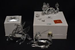 Three modern Swarovski silver crystal glass studies from the Fabulous creatures series including