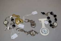 6 wrist watches all in various colours.