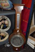 A mid century wall mounted barometer.