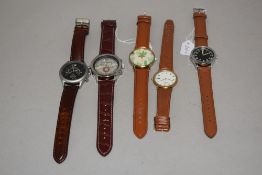 Five mens watches all having brown straps, including Rotary.