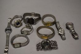 10 wrist watches all in silver tones.