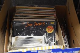 A mixed selection Vinyl Lp records and 45 rpm singles, to include Saw Doctors, Rod Stewart, Abba and