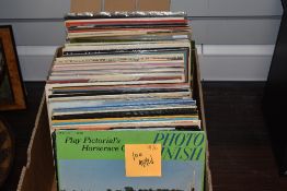 A box of one hundred mixed vinyl LP records, predominantly easy listening and classical.