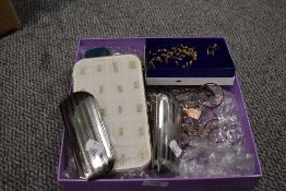 An assortment of optical screws, accessories, glasses and frames.