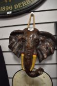 A moulded elephant wall hanging.