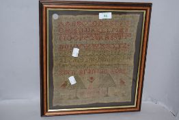 A Georgian sampler, using foliate imagery, animals and alphabet, By Ellen Branigan, aged 11, 1814.