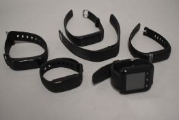 6 smart watches including Fitbits etc.