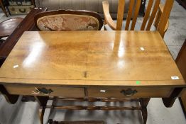 A Regency revival side table having drop flaps