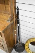 A vintage copper carriage or post horn and a bed warming pan