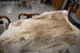 A Reindeer hide rug or throw