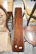 A Victorian mahogany drop leaf centre table having turned legs and carved base