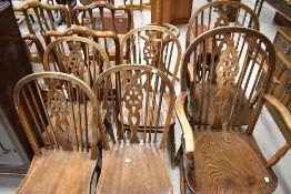 A set of six (four plus two) wheelback kitchen dining chairs