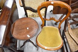 A modern small wine or side table with a balloon back chair