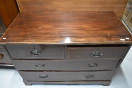 A 20th century chest of two over three drawers having inlayed banding detail on mahogany case