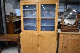 A utility unit, display cabinet over double cupboard, would make a great kitchen cabinet