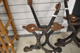 A pair of Victorian cast iron bench ends