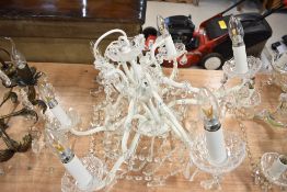 A glass electrolier/chandelier light fitting