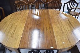 A 19th Century mahogany D end dining table , with single centre leaf , square tapered leg and