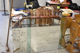 A large Art Deco mantel mirror having etched floral side panels and green glass inserts
