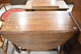 An early 20th Century oak twist gateleg table