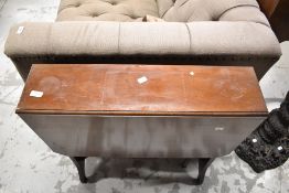 An Arts and Crafts mahogany table in the Simpson style, stamped 4161 to base