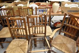 A set of six (four plus two) rush seated spindle back chairs