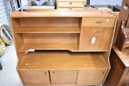 A vintage sapele sideboard unit of stylised design, probably 1960s