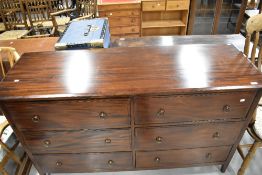 A modern mahogany sideboard having three by three drawers, width approx, 150cm
