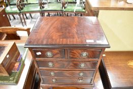 A reproduction Regency chest of drawers, small proportions, width approx. 42cm