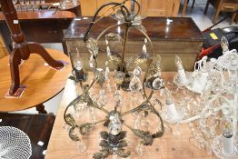A glass electrolier/chandelier light fitting