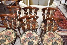 A set of six 'Fleur de Lys' style ercol kitchen dining chairs dark stained