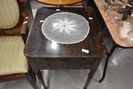 A late Victorian mahogany night stand having two frieze drawers, escutcheons removed