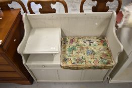 A vintage telephone table with under storage and drawer having been painted