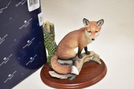 A Border Fine Arts figure study titled ' Sitting Safe ' A2027 with original box.