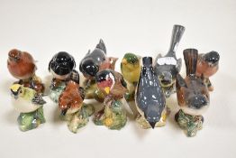 Eleven Beswick garden bird figure studies including Stonechat 2274, Chaffinch 991, Wren 993, Grey