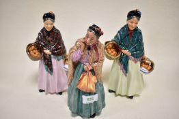 Three Royal Doulton figurines including Orange Lady HN1759 AF, Orange Lady Hn1953 and Bridget
