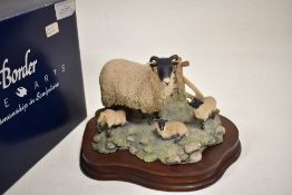 A Border Fine Arts figure study titled ' Spring Lambing ' JH6 with original box