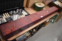 A lined box for a decorative Samuri sword.