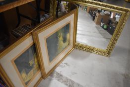 A modern bevelled wall mirror sold together with two modern prints.