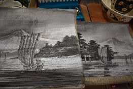 Two vintage Oriental metallic canvases depicting mountain and boat scenes.