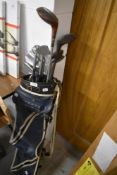 A part set of golf clubs in bag including numbers 1-7 of GH Chalk Mac irons.