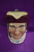 A Royal Doulton Toby jug depicting Simon The Cellarer.
