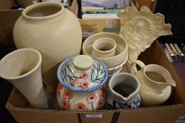 A Pearsons of Chesterfield stoneware vase in cream along with a selection of cream planters and jugs