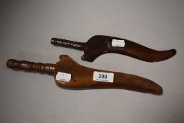 Two 19th century knitting sticks, one decorated with heart design