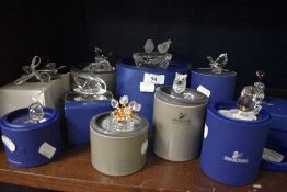 A group of ten small Swarovski crystal studies, to include Swan, cat, bear, owl, robin, each with