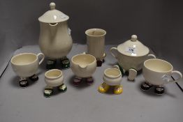 A group of Carlton Ware novelty teawares, and egg cups, the teapot with indistinct marks, crazing