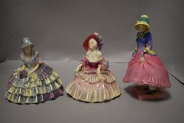 Three 20th century Royal Doulton figure studies including Evelyn HN1622, Chloe HN1470 and
