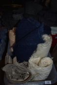 A box of mixed loosley woven material sold along with a box of Tweed design material